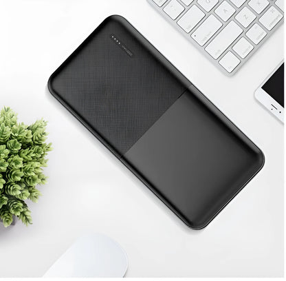 Black and white 20000 mAh power bank with heating function showing multi-USB ports