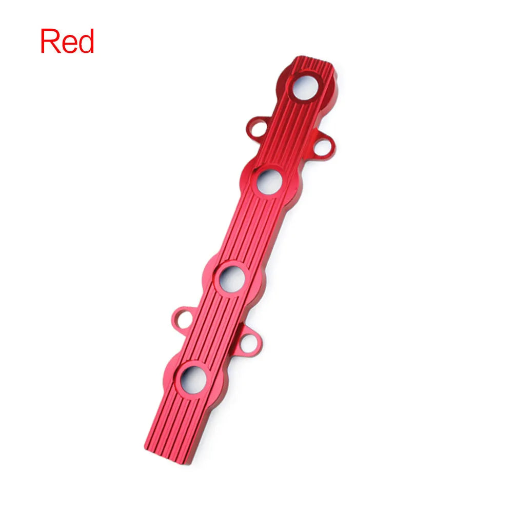 Aluminium alloy car engine wiring harness housing in blue, red, and silver colours