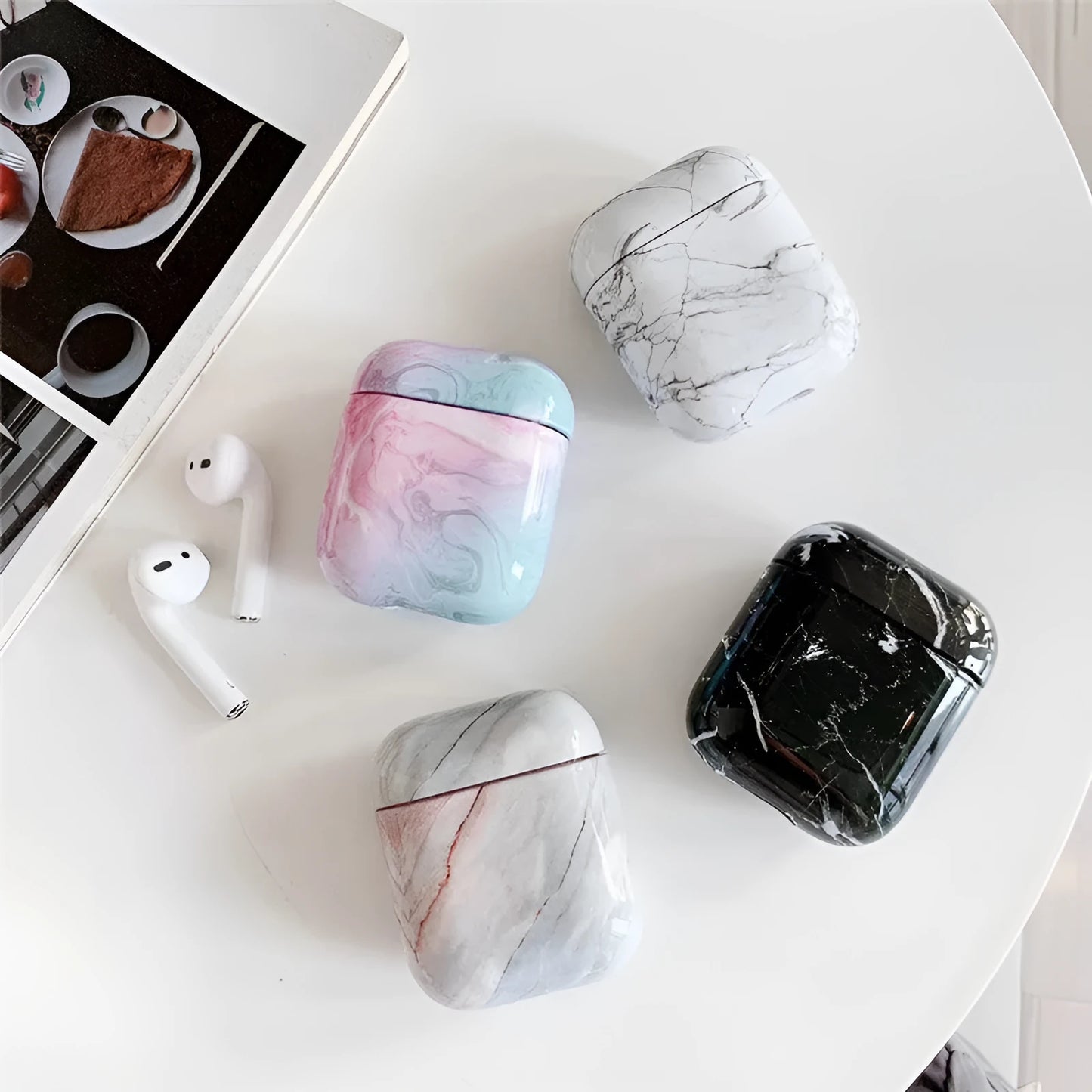 White marble hard PC protective case for AirPods charging box showing scratch protection