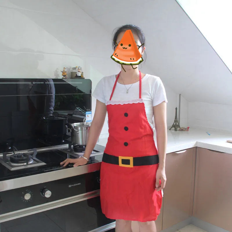 Red Christmas apron with Merry Christmas text available in adult and children's sizes
