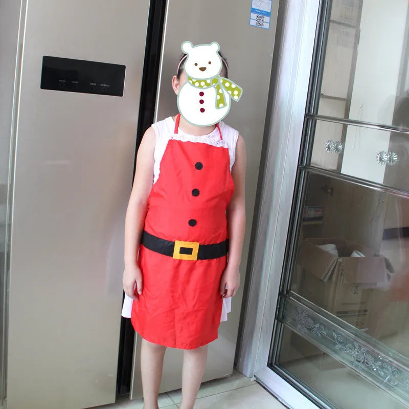 Red Christmas apron with Merry Christmas text available in adult and children's sizes