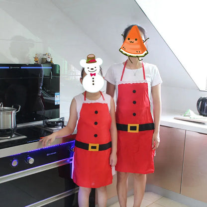Red Christmas apron with Merry Christmas text available in adult and children's sizes