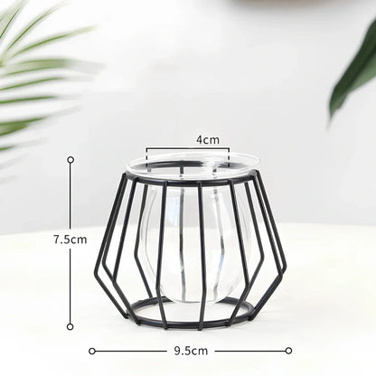 Geometric glass desktop decoration with iron frame in black and gold colours