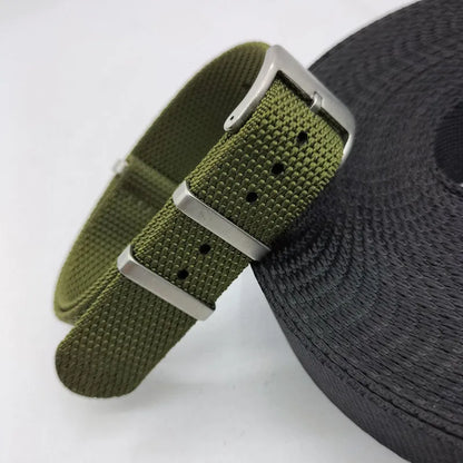 Integrated nylon watch strap in Army Green colour showing textile construction and attachment to watch lugs