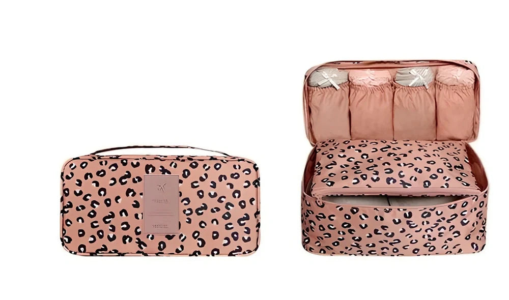 Compact travel underwear organizer in navy blue, 28cm x 14cm x 14.5cm with mesh pockets for packing