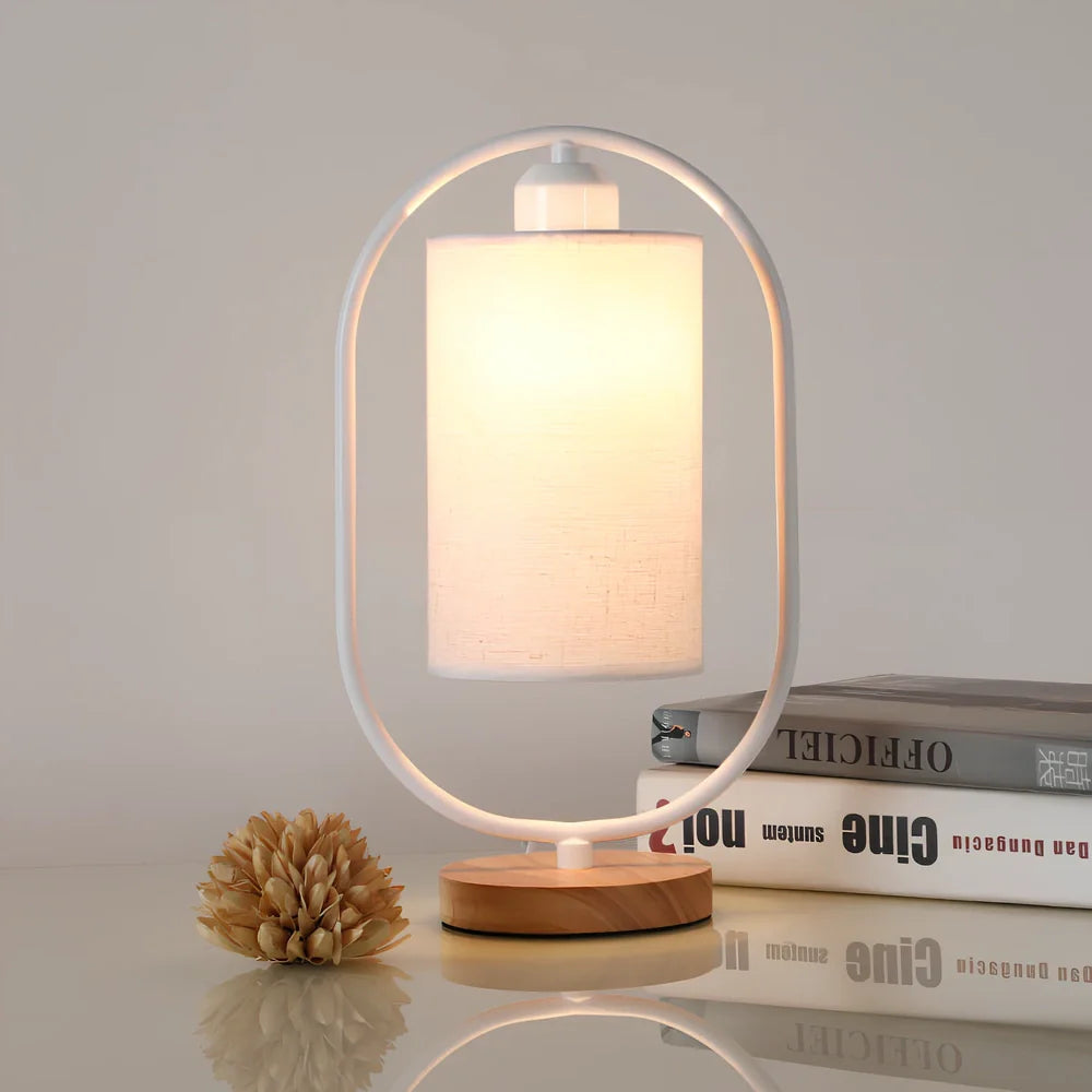 Black metal bedside lamp with dimming button and 5W LED warm light on wooden table