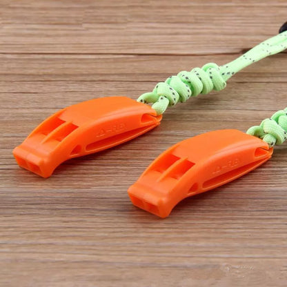 Fire Survival Whistle with dual-frequency sound emission for emergency signaling