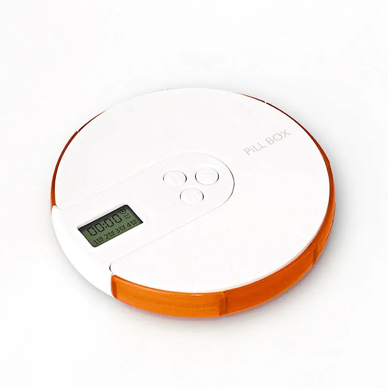 7-compartment alarm clock pill dispenser showing medication organisation with timer display