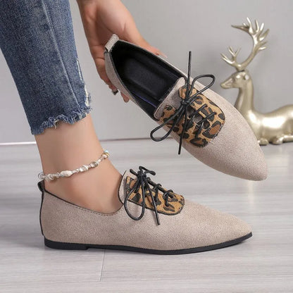 Beige leopard print women's pumps with pointed toe design and rubber sole