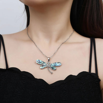 Abalone shell pendant necklace with copper electroplated animal zodiac design and butterfly or dragonfly detail