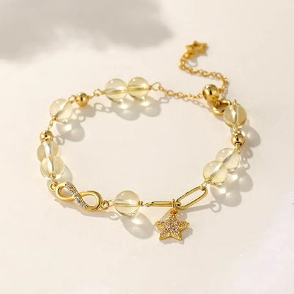Women's mobius loop bracelet made with natural grey moonstone, strawberry quartz, or citrine crystal beads in a constellation design.
