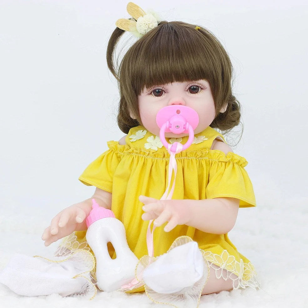 Interactive baby doll with drinking bottle showing 46cm length and 360-degree rotating limbs