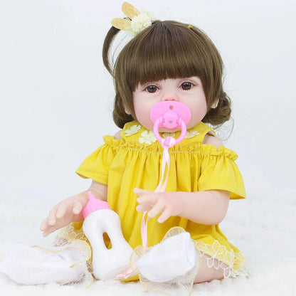Interactive baby doll with drinking bottle showing 46cm length and 360-degree rotating limbs