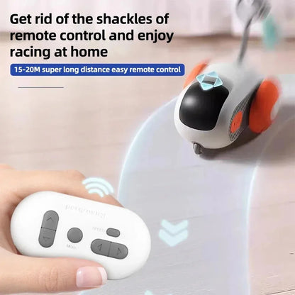 Blue remote-controlled smart cat toy car with feather teaser attachment on hard floor