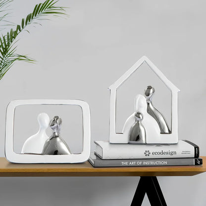 Ceramic photo frame with electroplated finish displaying character design elements