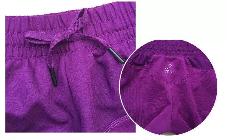 Quick-drying nylon athletic shorts in purple, available in sizes S to XL