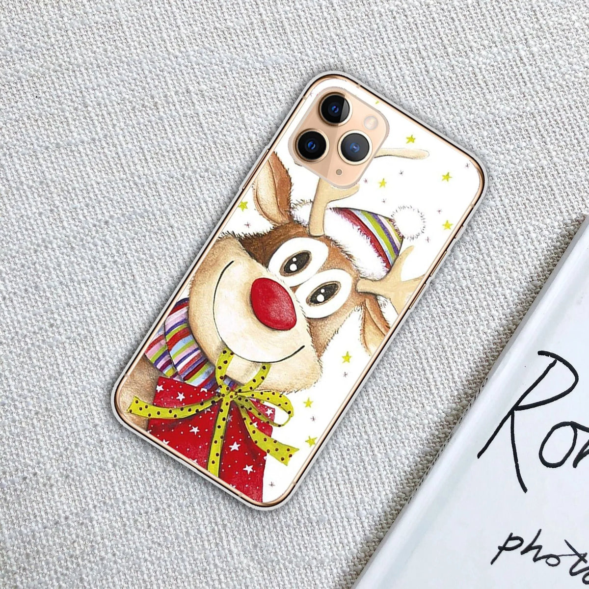 Christmas transparent phone case with festive design for iPhone models, available in eight styles.