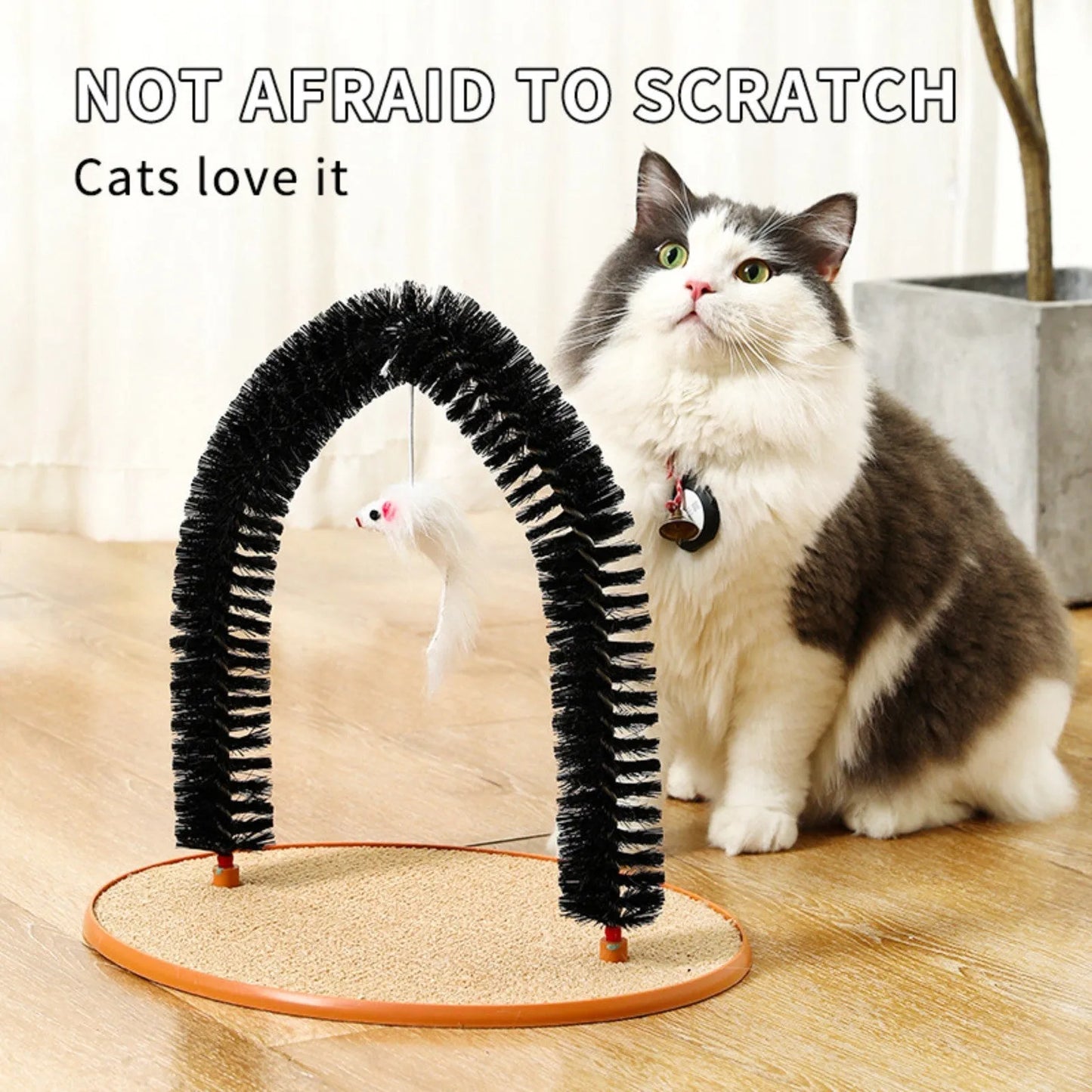 Black arch-shaped cat grooming brush with scratching fibre and an attached mouse toy on a non-slip base