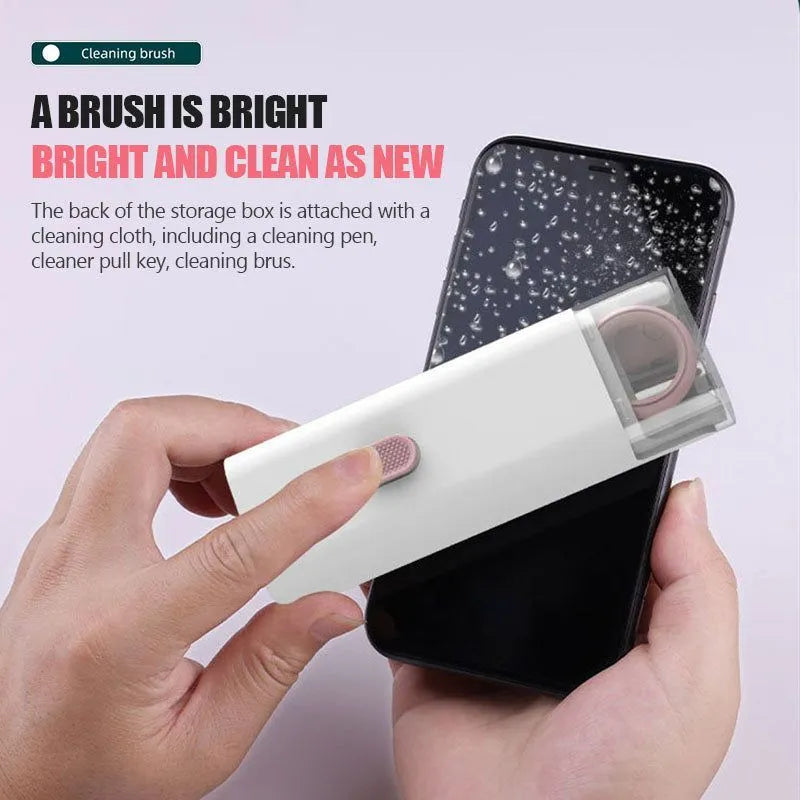 Multifunctional white cleaning pen kit open to show silicone tip, brush, keycap puller, and spray bottle for electronics.