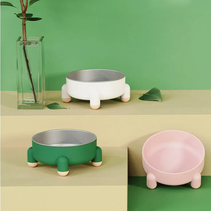 Green stainless steel pet bowl with anti-overturn base and high foot for dogs and cats.