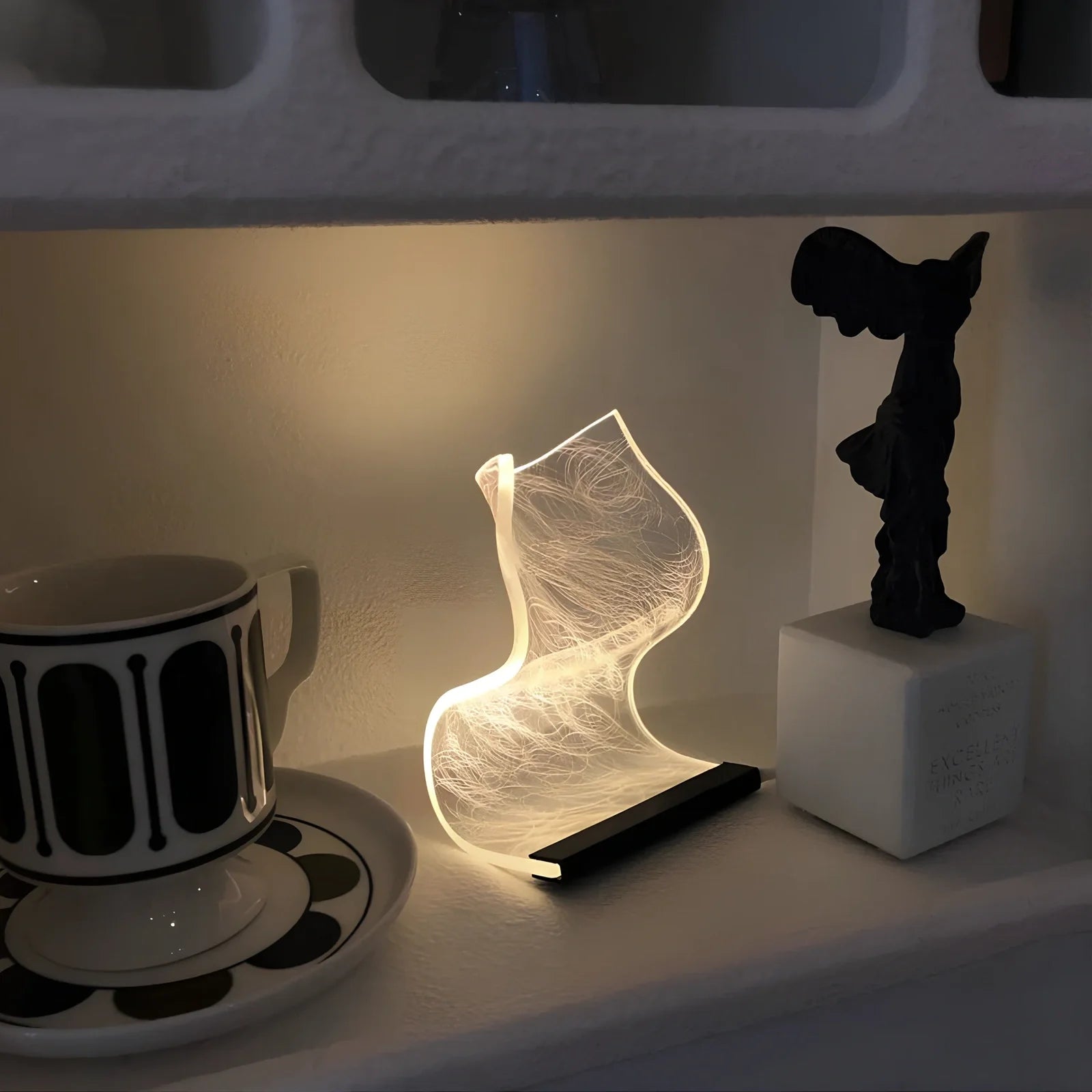 USB-powered bedside lamp with three-colour light adjustment in Nordic design