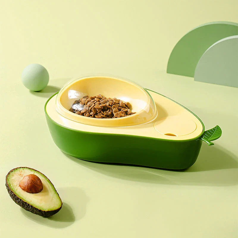 Avocado-shaped automatic pet feeder and water dispenser for dogs and cats, featuring slow-feed bowl, adjustable water flow, and durable construction