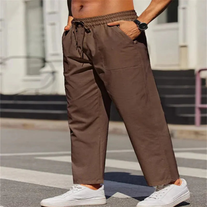 Men's straight-leg linen trousers in apricot colour with elastic waistband