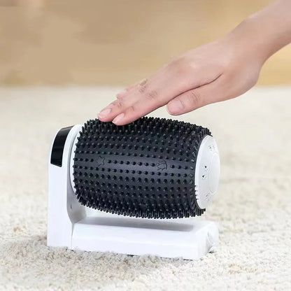 White automatic cat self groomer mounted in corner with soft silicone bristles