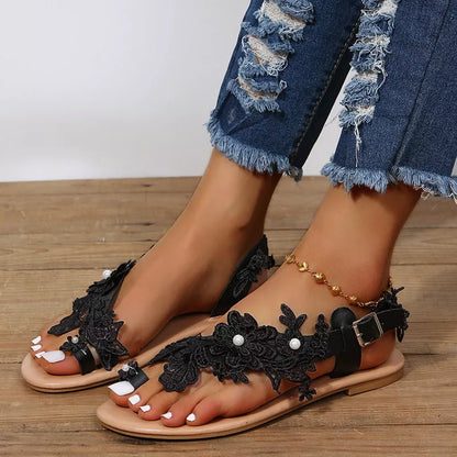 Bohemian lace sandals with floral ankle strap in white and black