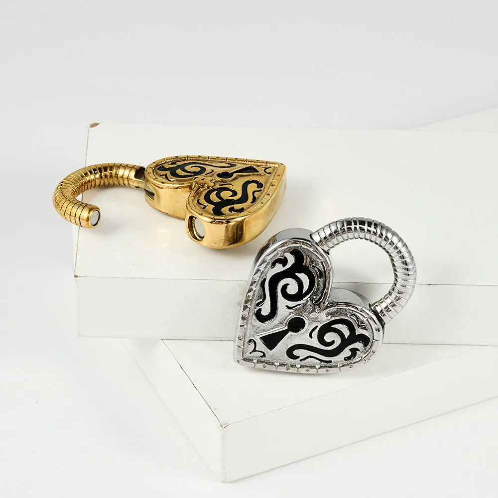 Women's heart-shaped fashion earrings in stainless steel with gold or steel colour electroplating