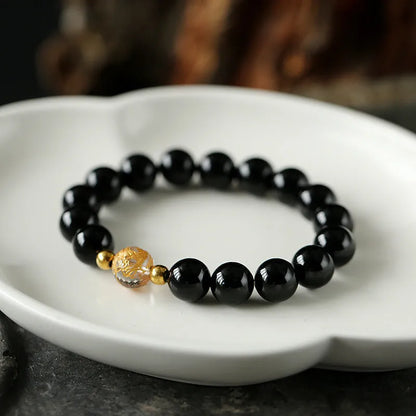 Geometric obsidian black agate white crystal bracelet with golden dragon charm on 14-16cm wrist