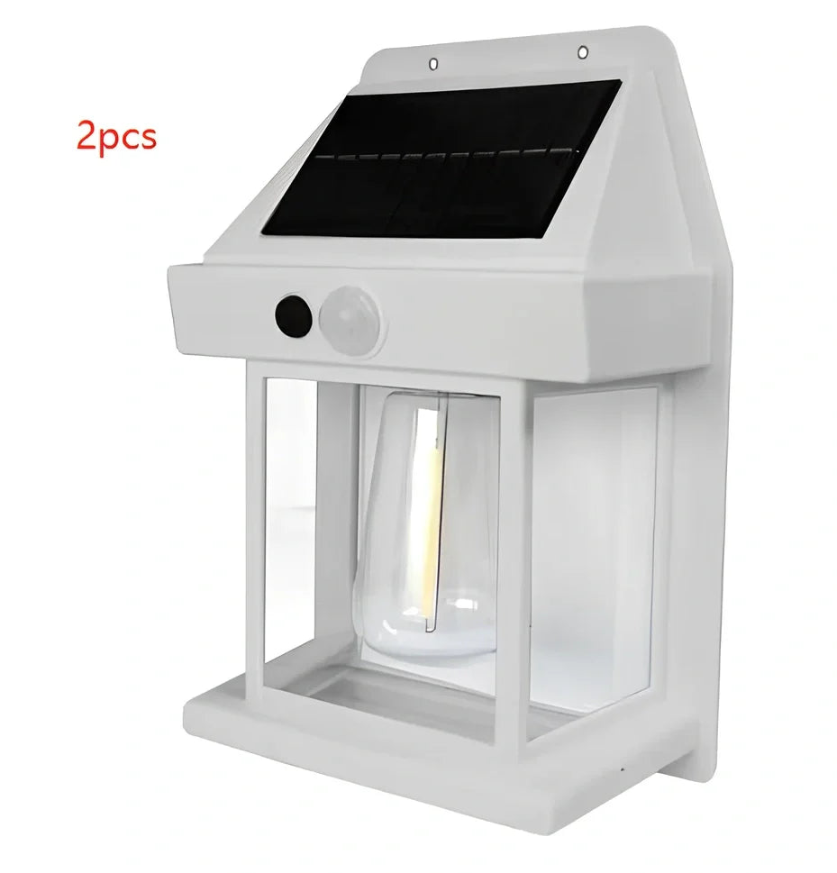 Black solar garden wall lamp with waterproof IP65 rating and automatic light sensor for outdoor installation