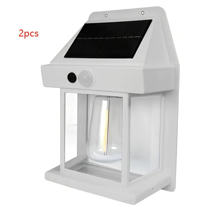 Black solar garden wall lamp with waterproof IP65 rating and automatic light sensor for outdoor installation