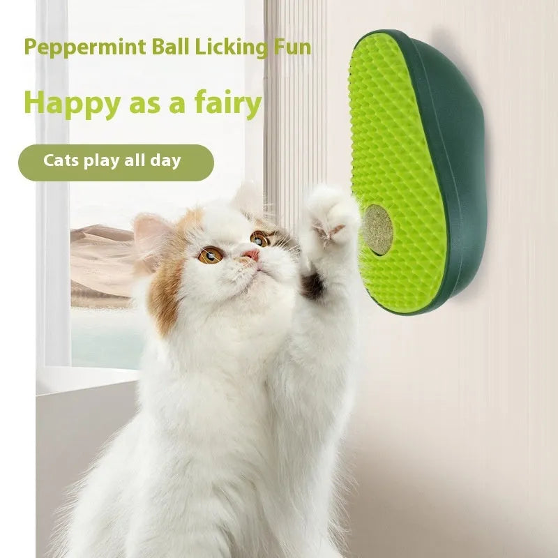 Green avocado-shaped cat toy with a central scratching post for cats.
