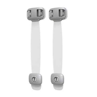 Grey adjustable child safety lock strap with 3M adhesive, shown securing a cabinet door.