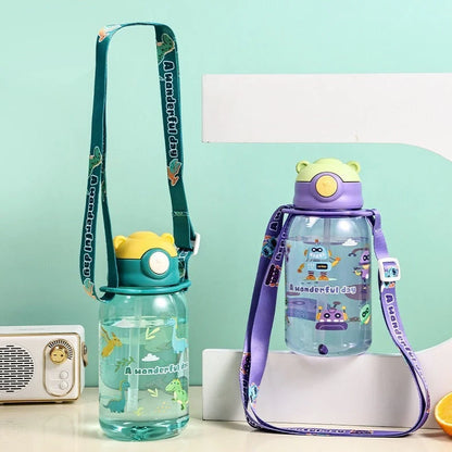 Red children's water cup with shoulder strap showing cartoon pattern and suction nozzle
