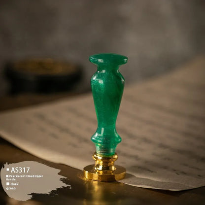 Wooden wax seal handle tool in various designs including lily, pearl cloud, and double dragon styles.
