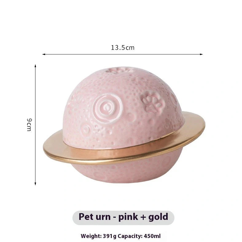 Handmade ceramic cinerary casket with cosmic starry sky design and cat-dog motifs in multiple colours