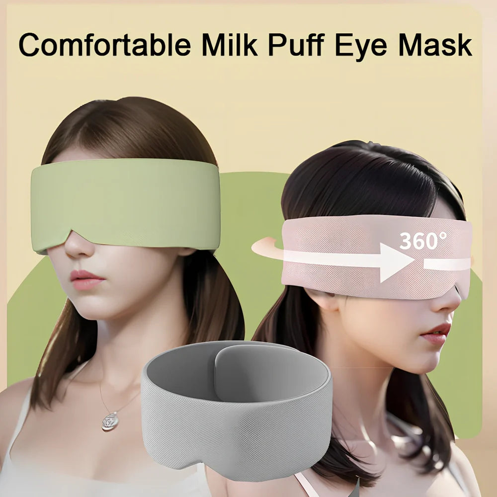 Gray double-sided sleep mask showing cool ice silk side and warm cotton side with adjustable magic tape closure
