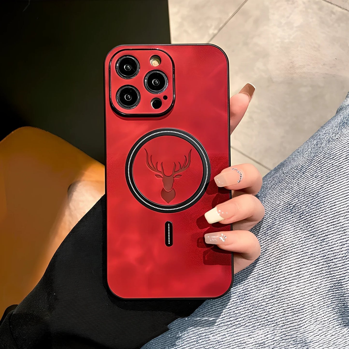 Elk magnetic suction phone case with cartoon design showing magnetic closure and imitation leather texture
