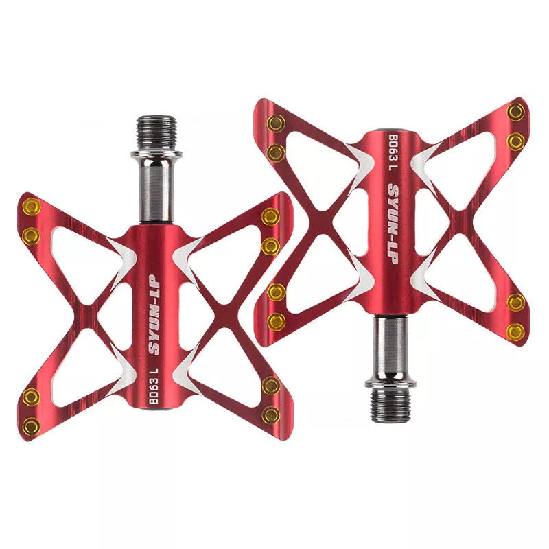 Bicycle Palin Foot Pedal PD-M56 in carbon black, titanium silver, and bright gold