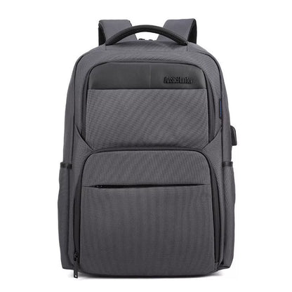 Men's USB charging anti-theft backpack in grey, blue, or black with multiple compartments