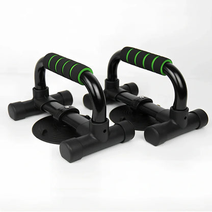 Green suction cup push-up bracket with electroplated steel frame and foam handles for chest exercises
