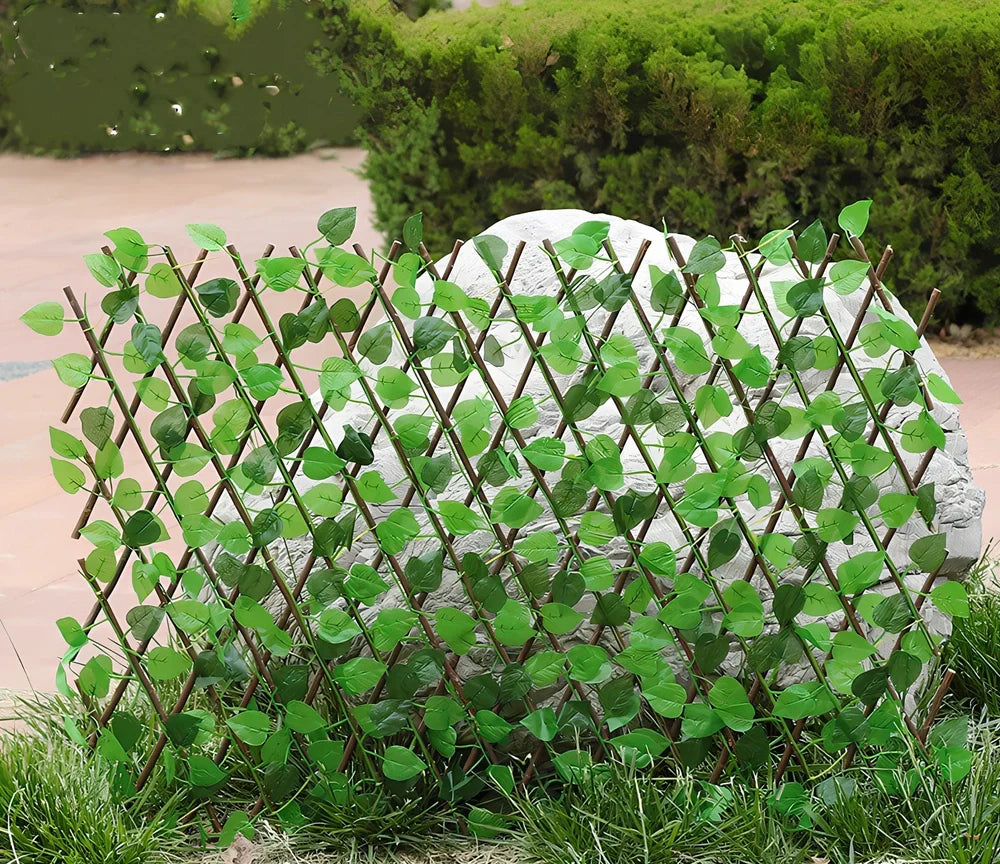 Plastic simulation wooden fence panel showing realistic wood grain texture in outdoor setting