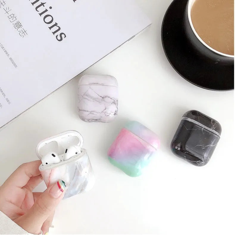 White marble hard PC protective case for AirPods charging box showing scratch protection
