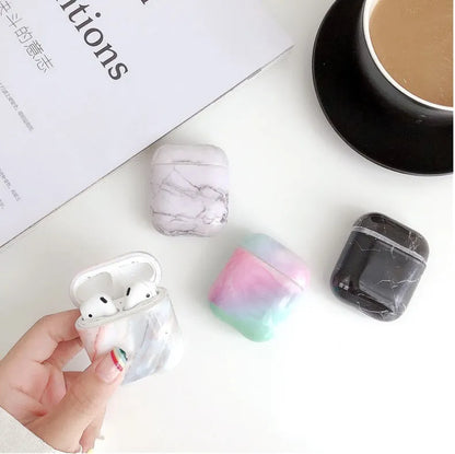 White marble hard PC protective case for AirPods charging box showing scratch protection