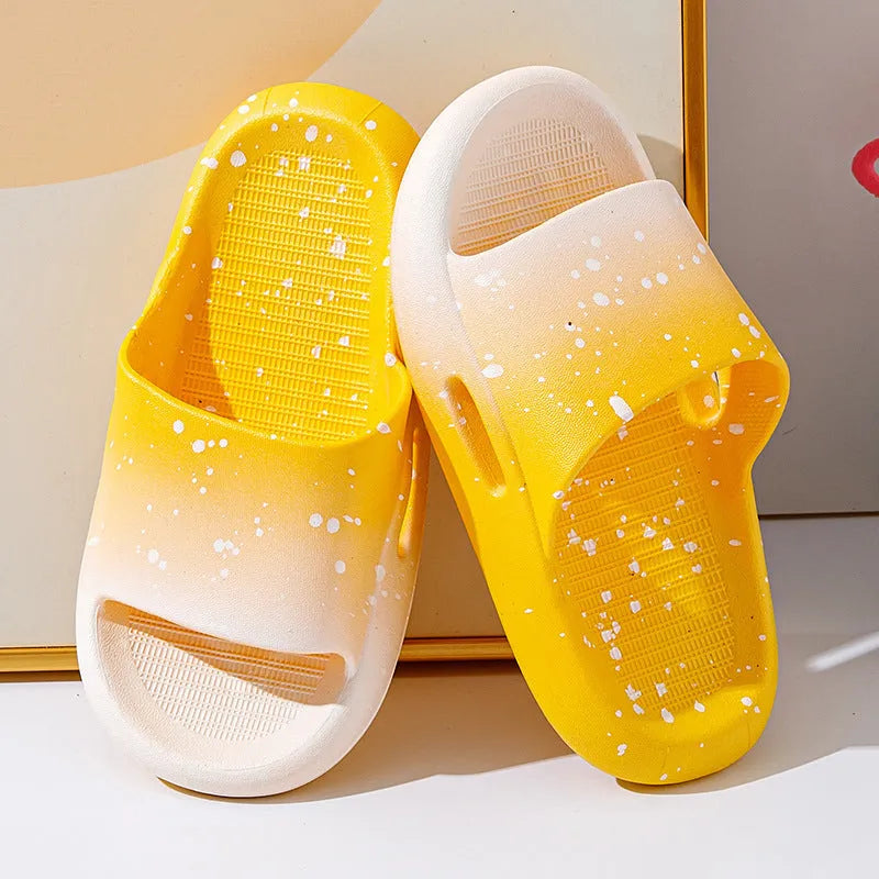 Gradient blue PVC slipper for children on a white background, showing non-slip sole.