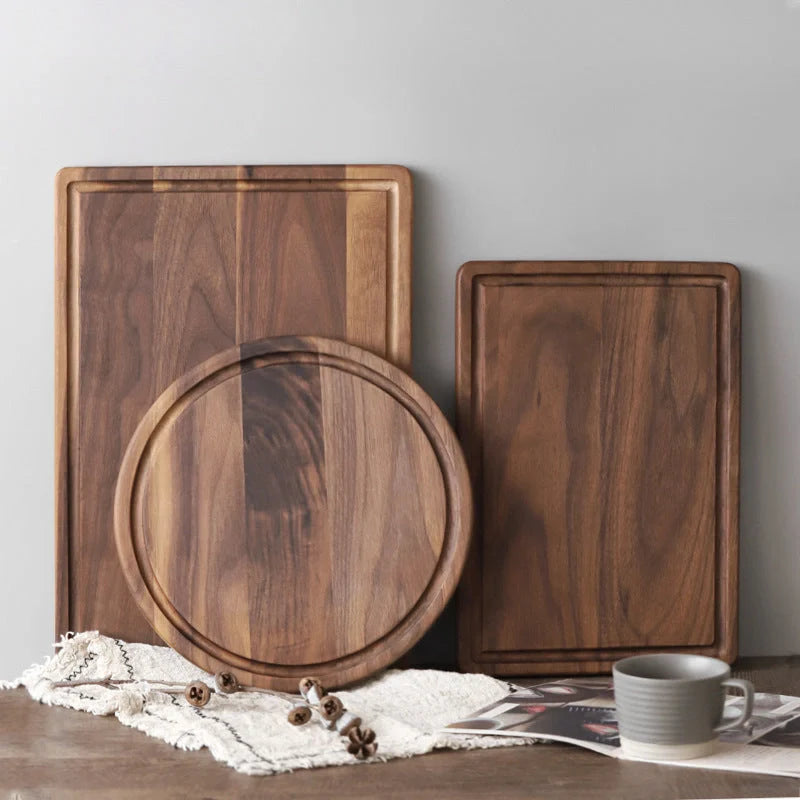 Premium black walnut wood cutting board with a versatile 2-sided design for chopping, slicing, and serving in the kitchen