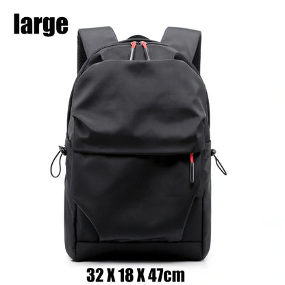 Sleek and durable nylon backpack with spacious compartments for everyday use.