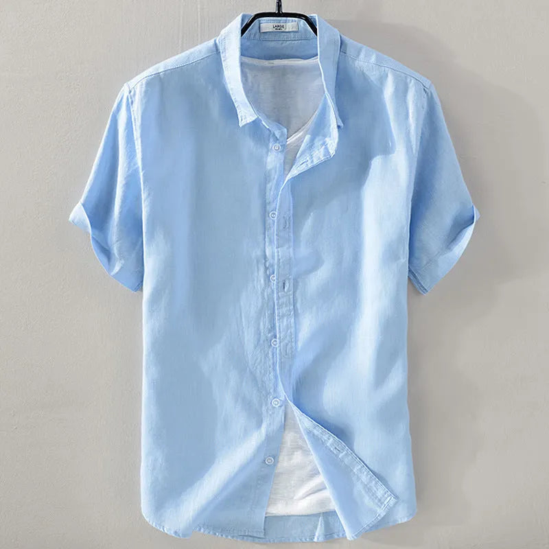 Men's light blue short sleeve linen blend casual shirt with a loose fit.